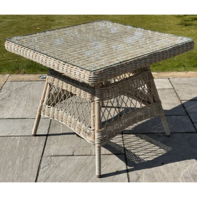 Built with a rust-resistant aluminium frame and a chunky HDPE wicker weave, it offers the authentic look of rattan with superior weather resistance. The tempered glass tabletop adds a sleek, practical finish, while plush Olefin cushions provide comfort with showerproof and UV-resistant protection.
